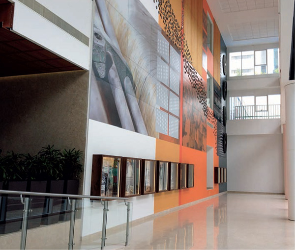 Campus-with-a-Green-Heart--NKP-The-grand-lobby-mural-showing-history-Nirlon-illustrate-synergy-history-design-art