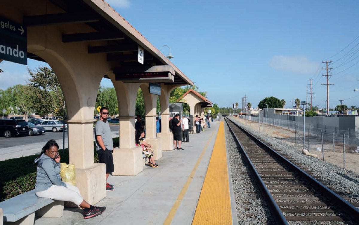 Streetcar-Desired-Opportunity-Costs-Transit-San-Fernando’s-Metrolink-Station-surrounded-parking-lots-low-density-buildings-vacant–environmentromote-transit-ridership