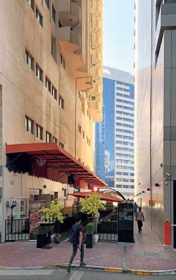 Trip-Abu-Dhabi’s-Planning-History-Cafe-sikka-apartment-buildings