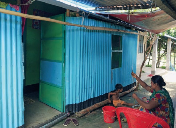 Housing-Metamorphosis-Resettlement-Sites-Veranda-converted-bedroom-open-space-household-work
