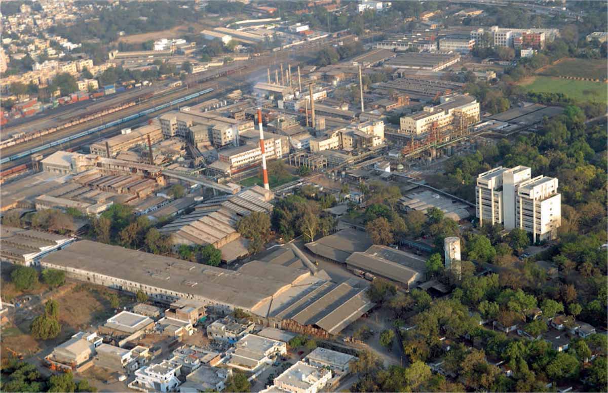 Art-Culture-Dynamos-Urban-Redevelopment-aerial-view-Alembic-production-facilities-concentrated-eastern-flank-railway-line