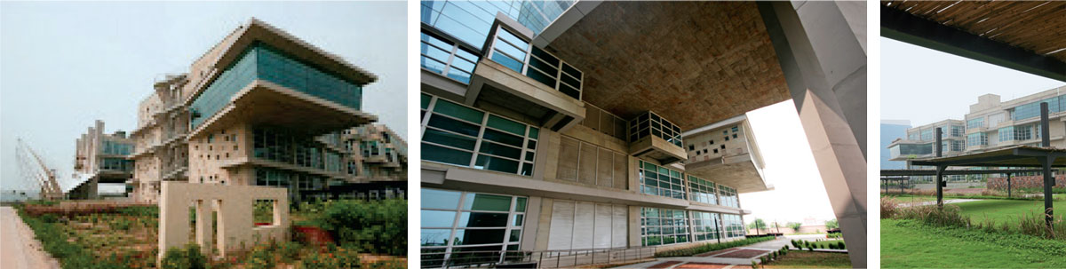 Sustainability-in-Design-north-facade-outwards-magnificent-views-formal-visitors’-entry-triple-height-space-integrates-water-body-concrete-sheer-wall--parking-lot-consists-bamboo-shaded-turf-designed-high-axle-loads