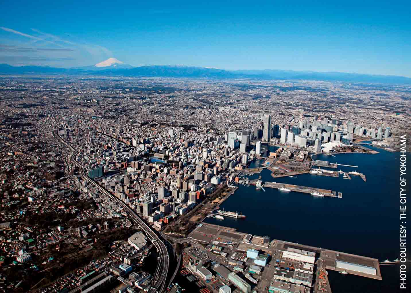 post-war-rebirth-yokohama-aerial-photo-port-mt-fuji-symbol-japan-background 